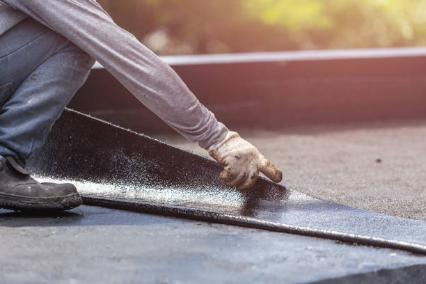 Professional Basement Waterproofing technician working in Bellmore, NY